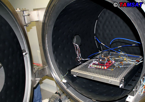 Figure - 4. TAMSAT V/U TRANSPONDER in TVAC Chamber.